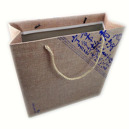 产品介绍 产品名称:厂家定做 白板纸茶叶纸袋 烫蓝色金高档纸袋 礼盒
